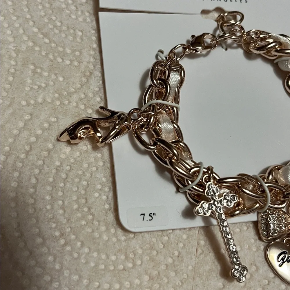 Guess Gold-Tone Charm Bracelet with Sparkling Accents - Picture 4 of 4